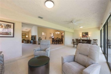 Tranquil, spotless, and effortlessly inviting, this on Palm Aire Country Club of Sarasota in Florida - for sale on GolfHomes.com, golf home, golf lot