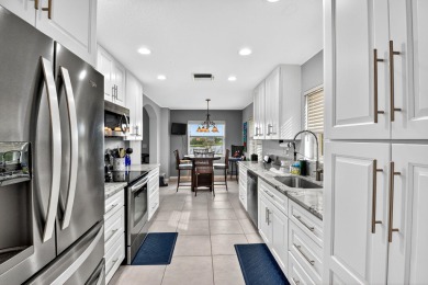 RARELY AVAILABLE 2nd floor coach home with interior elevator on  in Florida - for sale on GolfHomes.com, golf home, golf lot