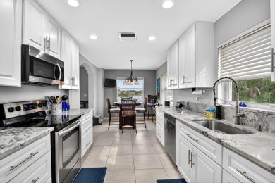 RARELY AVAILABLE 2nd floor coach home with interior elevator on  in Florida - for sale on GolfHomes.com, golf home, golf lot