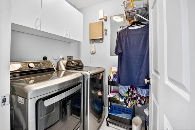RARELY AVAILABLE 2nd floor coach home with interior elevator on  in Florida - for sale on GolfHomes.com, golf home, golf lot