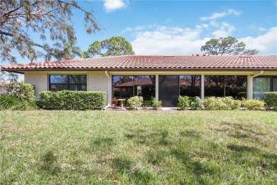 Tranquil, spotless, and effortlessly inviting, this on Palm Aire Country Club of Sarasota in Florida - for sale on GolfHomes.com, golf home, golf lot