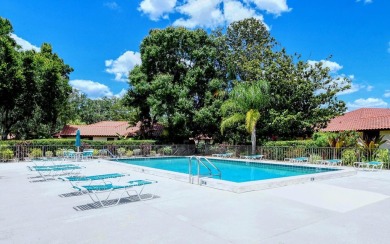 Tranquil, spotless, and effortlessly inviting, this on Palm Aire Country Club of Sarasota in Florida - for sale on GolfHomes.com, golf home, golf lot