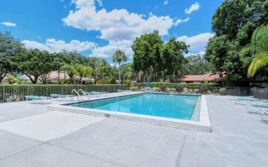 Tranquil, spotless, and effortlessly inviting, this on Palm Aire Country Club of Sarasota in Florida - for sale on GolfHomes.com, golf home, golf lot