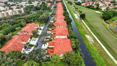RARELY AVAILABLE 2nd floor coach home with interior elevator on  in Florida - for sale on GolfHomes.com, golf home, golf lot