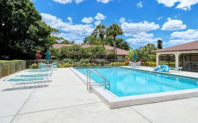 Tranquil, spotless, and effortlessly inviting, this on Palm Aire Country Club of Sarasota in Florida - for sale on GolfHomes.com, golf home, golf lot