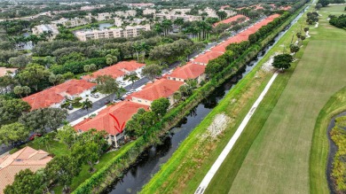 RARELY AVAILABLE 2nd floor coach home with interior elevator on  in Florida - for sale on GolfHomes.com, golf home, golf lot