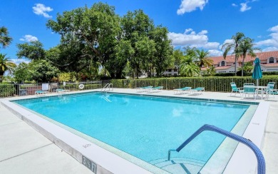 Tranquil, spotless, and effortlessly inviting, this on Palm Aire Country Club of Sarasota in Florida - for sale on GolfHomes.com, golf home, golf lot