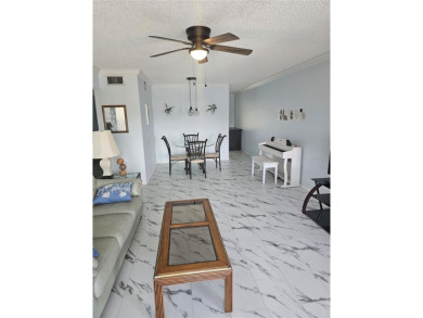 No flood Zone here! Very appealing two bedroom, two bath condo on On Top Of The World Golf Course in Florida - for sale on GolfHomes.com, golf home, golf lot