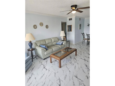 No flood Zone here! Very appealing two bedroom, two bath condo on On Top Of The World Golf Course in Florida - for sale on GolfHomes.com, golf home, golf lot