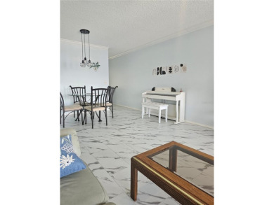 No flood Zone here! Very appealing two bedroom, two bath condo on On Top Of The World Golf Course in Florida - for sale on GolfHomes.com, golf home, golf lot