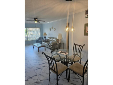 No flood Zone here! Very appealing two bedroom, two bath condo on On Top Of The World Golf Course in Florida - for sale on GolfHomes.com, golf home, golf lot