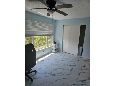 No flood Zone here! Very appealing two bedroom, two bath condo on On Top Of The World Golf Course in Florida - for sale on GolfHomes.com, golf home, golf lot