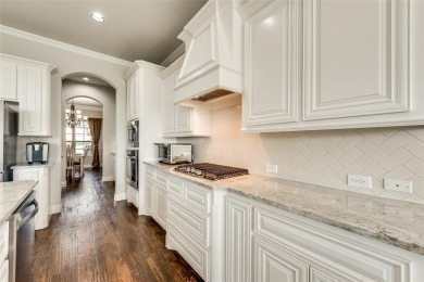 Elegant 1.5-story home at 2000 Fox Bend Trace in the Bridges at on The Bridges Golf Club in Texas - for sale on GolfHomes.com, golf home, golf lot