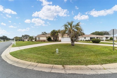 Welcome to effortless Florida living in this beautifully on Eagle Ridge At Spruce Creek Country Club in Florida - for sale on GolfHomes.com, golf home, golf lot