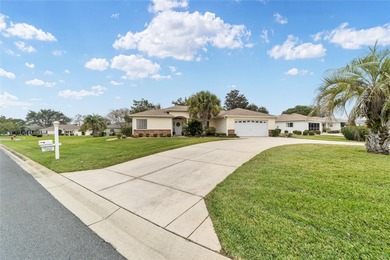 Welcome to effortless Florida living in this beautifully on Eagle Ridge At Spruce Creek Country Club in Florida - for sale on GolfHomes.com, golf home, golf lot