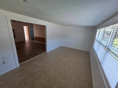This stunning remodeled 3 spacious bedroom, 2 fully updated on Lakes at Leesburg Golf Course in Florida - for sale on GolfHomes.com, golf home, golf lot