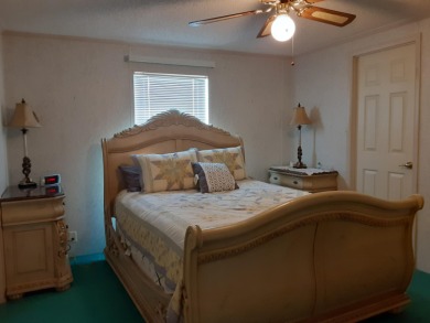 Nicely maintained and one of the largest mobile homes in Spanish on Spanish Lakes Fairways in Florida - for sale on GolfHomes.com, golf home, golf lot