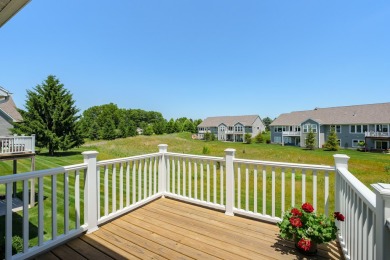 Enjoy easy living just steps from Angels Crossing Golf Course in on Angels Crossing Golf Club in Michigan - for sale on GolfHomes.com, golf home, golf lot