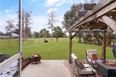 Welcome to 107 Hickory Pine, a stunning 4-bedroom, 3-bathroom on Oak Grove Island Golf and Country Club in Georgia - for sale on GolfHomes.com, golf home, golf lot