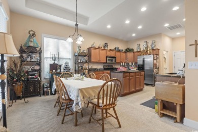 Beautiful Mediterranean Style Ranch Home with side-load garage on Palmetto Greens Golf and Country Club in South Carolina - for sale on GolfHomes.com, golf home, golf lot