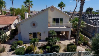 2.25 assumable loan to Qualified buyers 2-Story home located on on Chaparral Golf and Country Club in Arizona - for sale on GolfHomes.com, golf home, golf lot