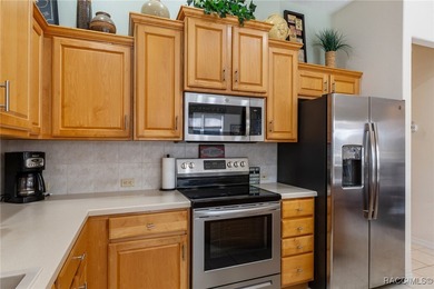 A little bit of heaven awaits you in this maintenance free on Southern Woods Golf Club in Florida - for sale on GolfHomes.com, golf home, golf lot