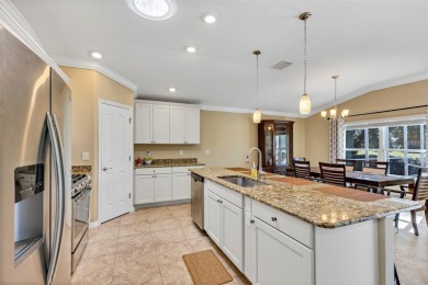 Life is better poolside! Wasting away again can be your on Arlington Ridge Golf Club in Florida - for sale on GolfHomes.com, golf home, golf lot