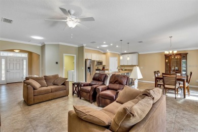 Life is better poolside! Wasting away again can be your on Arlington Ridge Golf Club in Florida - for sale on GolfHomes.com, golf home, golf lot