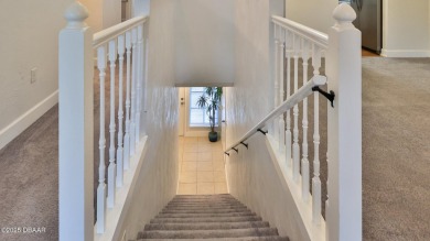 Step out your door with your golf clubs in hand!  The perfect on Daytona Beach Golf Club in Florida - for sale on GolfHomes.com, golf home, golf lot