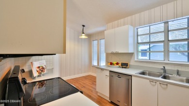 Step out your door with your golf clubs in hand!  The perfect on Daytona Beach Golf Club in Florida - for sale on GolfHomes.com, golf home, golf lot