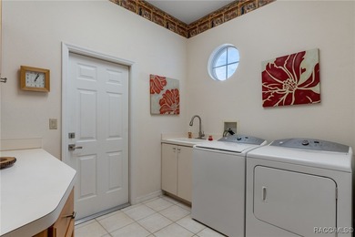 A little bit of heaven awaits you in this maintenance free on Southern Woods Golf Club in Florida - for sale on GolfHomes.com, golf home, golf lot