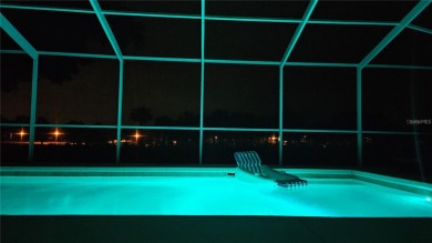 Life is better poolside! Wasting away again can be your on Arlington Ridge Golf Club in Florida - for sale on GolfHomes.com, golf home, golf lot