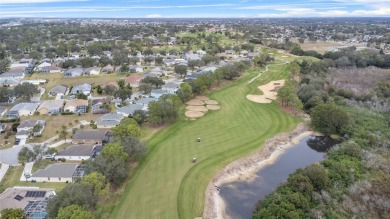 Welcome to your dream home in the heart of a stunning, gated on Southern Dunes Golf and Country Club in Florida - for sale on GolfHomes.com, golf home, golf lot