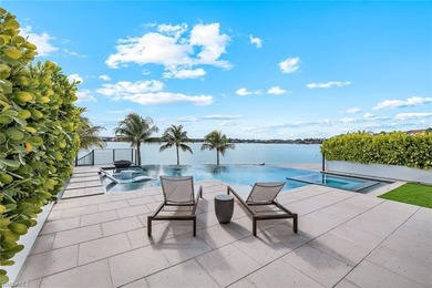 Experience the pinnacle of modern luxury on this extraordinary on Miromar Lakes Golf Club in Florida - for sale on GolfHomes.com, golf home, golf lot