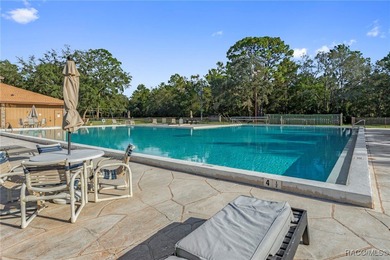 A little bit of heaven awaits you in this maintenance free on Southern Woods Golf Club in Florida - for sale on GolfHomes.com, golf home, golf lot