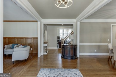 Nestled within the prestigious Chattahoochee River Club, this on Sugar Hill Golf Club in Georgia - for sale on GolfHomes.com, golf home, golf lot