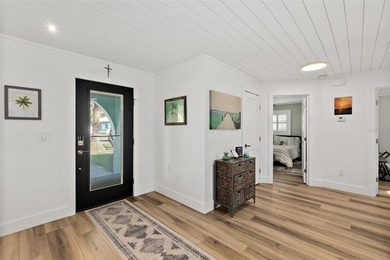 Your perfect beachside bungalow awaits! Just a short two-block on Ocean Palm Golf Course in Florida - for sale on GolfHomes.com, golf home, golf lot