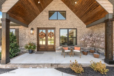 All brick custom home built in 2024 offers easy living one-level on Tellico Village -The Links At Kahite Golf Course in Tennessee - for sale on GolfHomes.com, golf home, golf lot