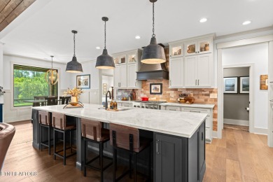 All brick custom home built in 2024 offers easy living one-level on Tellico Village -The Links At Kahite Golf Course in Tennessee - for sale on GolfHomes.com, golf home, golf lot