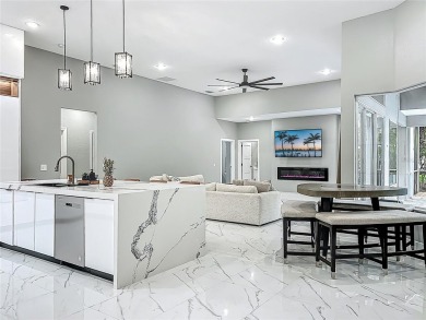 Welcome to a masterpiece of modern design and refined living in on Tuscawilla Country Club in Florida - for sale on GolfHomes.com, golf home, golf lot
