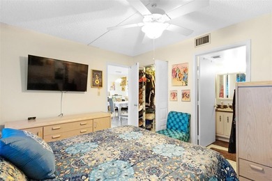 Beautifully updated top floor condo in the 55+ community of Palm on Oriole Golf and Tennis Club in Florida - for sale on GolfHomes.com, golf home, golf lot