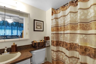 Beautifully updated top floor condo in the 55+ community of Palm on Oriole Golf and Tennis Club in Florida - for sale on GolfHomes.com, golf home, golf lot