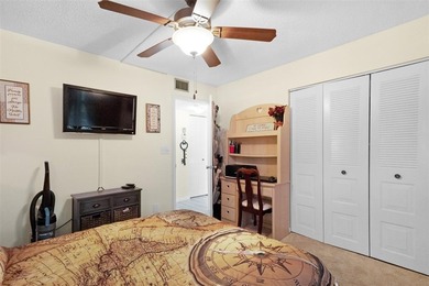 Beautifully updated top floor condo in the 55+ community of Palm on Oriole Golf and Tennis Club in Florida - for sale on GolfHomes.com, golf home, golf lot