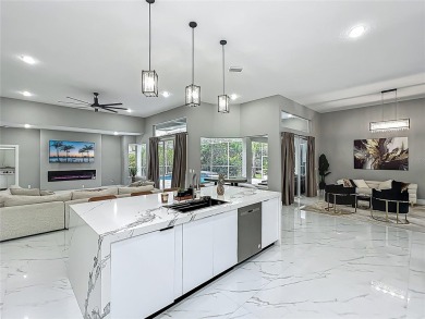 Welcome to a masterpiece of modern design and refined living in on Tuscawilla Country Club in Florida - for sale on GolfHomes.com, golf home, golf lot