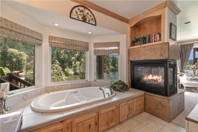 Discover luxury mountain living in this stunning 5-bedroom on Lake Arrowhead Country Club in California - for sale on GolfHomes.com, golf home, golf lot