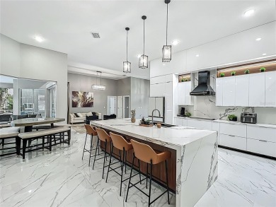 Welcome to a masterpiece of modern design and refined living in on Tuscawilla Country Club in Florida - for sale on GolfHomes.com, golf home, golf lot