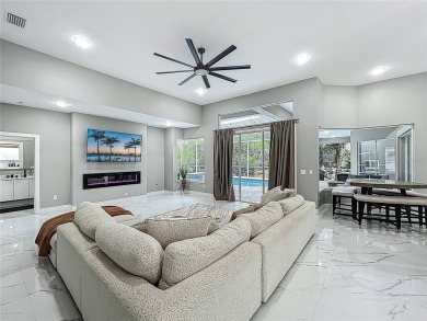 Welcome to a masterpiece of modern design and refined living in on Tuscawilla Country Club in Florida - for sale on GolfHomes.com, golf home, golf lot