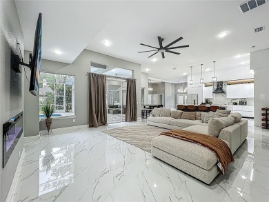 Welcome to a masterpiece of modern design and refined living in on Tuscawilla Country Club in Florida - for sale on GolfHomes.com, golf home, golf lot
