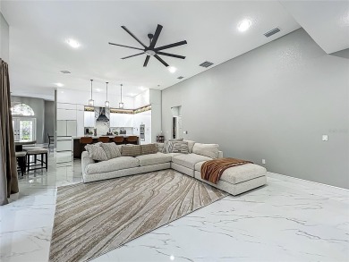 Welcome to a masterpiece of modern design and refined living in on Tuscawilla Country Club in Florida - for sale on GolfHomes.com, golf home, golf lot