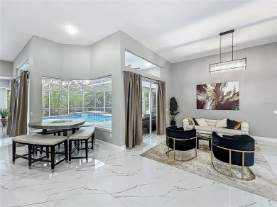Welcome to a masterpiece of modern design and refined living in on Tuscawilla Country Club in Florida - for sale on GolfHomes.com, golf home, golf lot